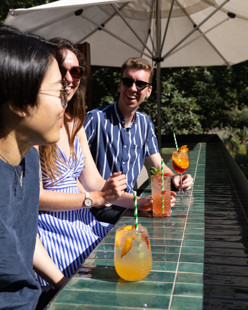 People enjoying drinks at Evergreen